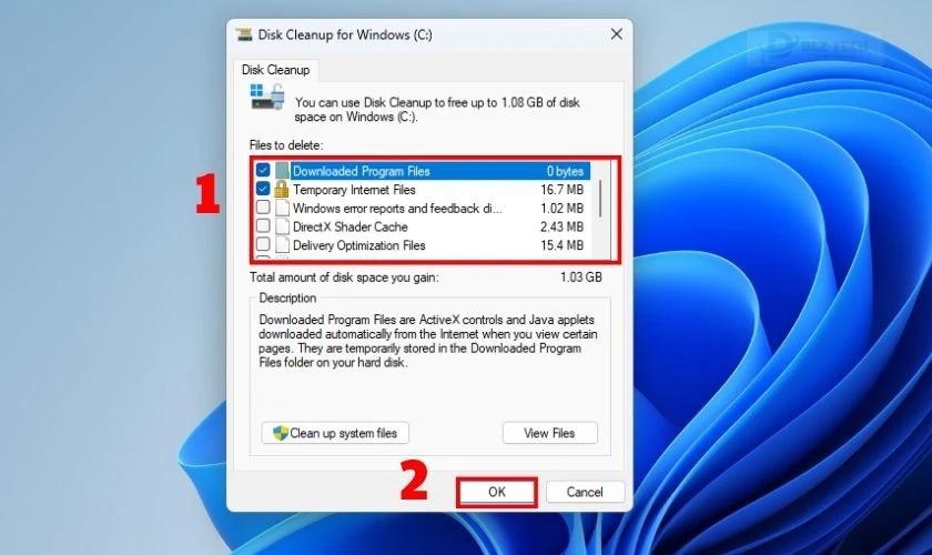 Trong cửa sổ Disk Cleanup, tick chọn các loại tệp tin rác mà bạn muốn xóa, bấm OK