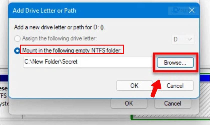 Chọn Mount in the following empty NTFS folder và nhấn Browse