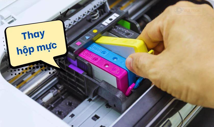 Thay hộp mực mới